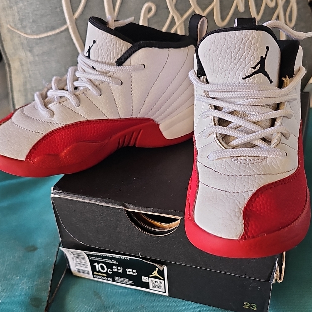 Jordan 12 Retro in White and Black with Red Accents